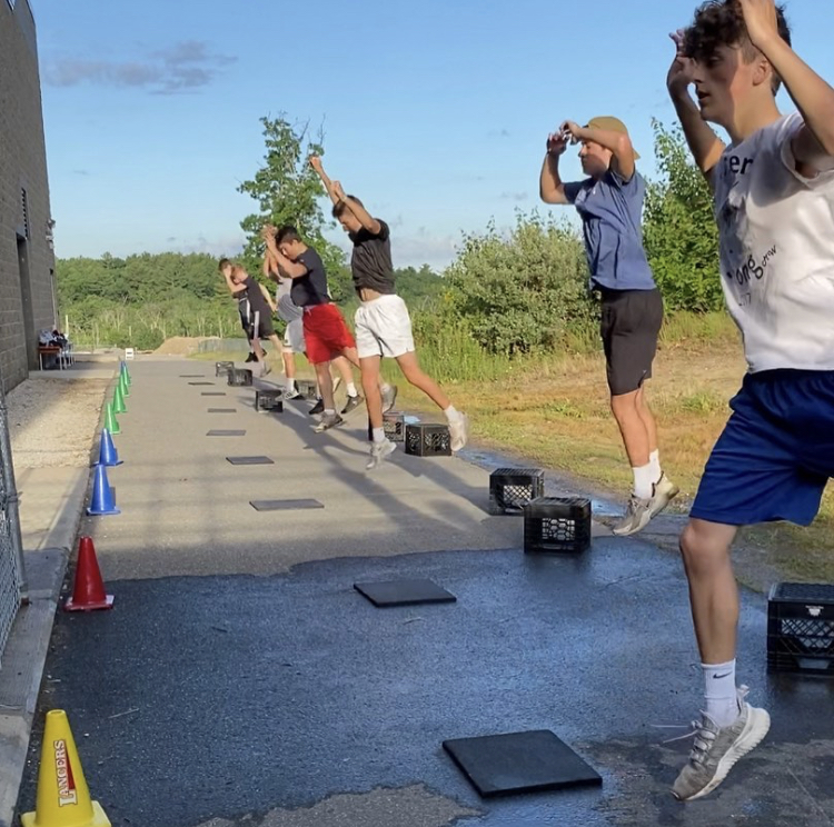 Lancer athletes practice social distancing while completing their workouts during the Lancer Power summer lifting program.