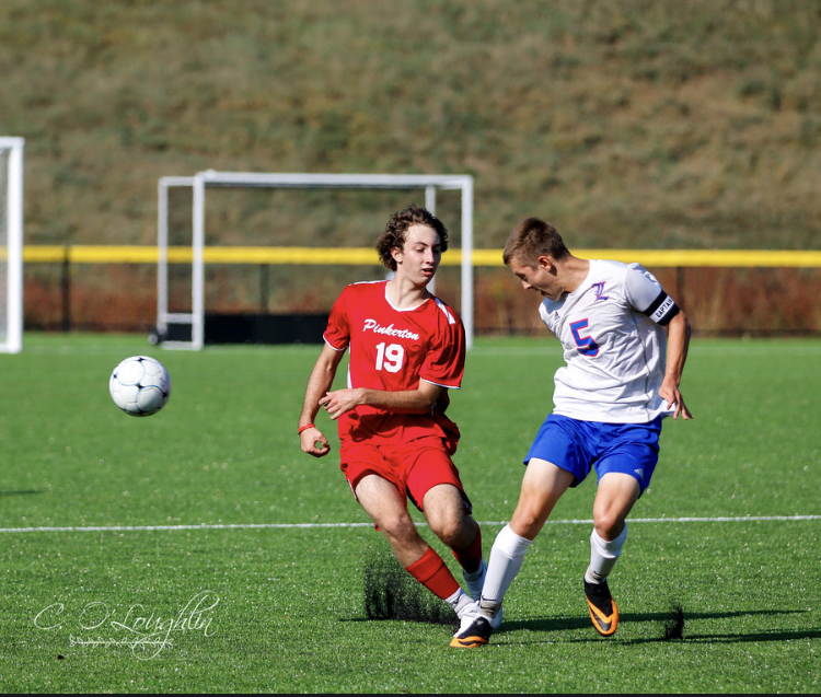  My expectations for this season is to win all our games and have fun this year. I have faith and confidence in our team to win all our games. We have been practicing really hard and focusing on our next game. The senior night game went really well! We pulled out a 2-0 win against Pinkerton. I performed really well. I was being vocal and coaching all the players throughout the game to help them and to ultimately win us the game, Captain Derrick Apholz said.