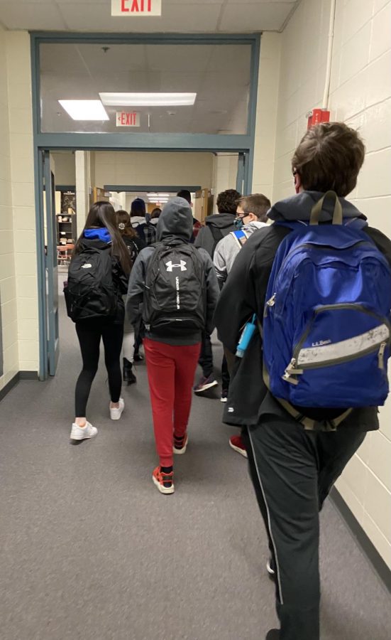 Students walk through the halls during their in-school day.