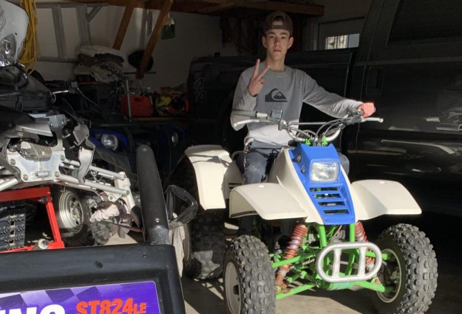 Senior Chris Setterlund sits on the first big sport quad he helped build. Setterlund has enjoyed building things ever since he was a kid, so he decided he would study mechanical engineering in college.