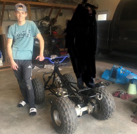 Setterland takes a moment to snap a photo before taking his newly built ATV for a ride.