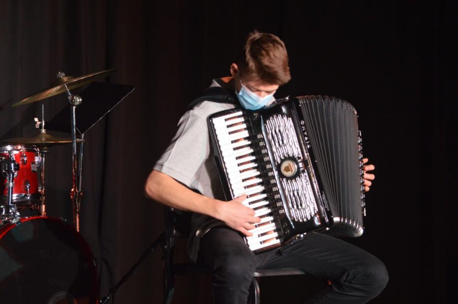 Camden Poitras plays the accordion in his performcance of Accordian Boogie in the later half of the Prism concert.