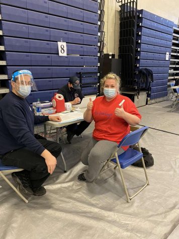 Ms. Sullivan receives her first COVID-19 vaccine. Teachers and staff who got vaccinated this day have to wait two weeks to receive the second dose. 