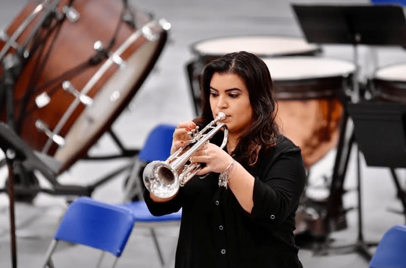 Senior+Amara+Cote%2C++performs+at+a+jazz+ensemble+concert+in+January+2021.+Cote+plays+the+trumpet+as+part+of+the+LHS+jazz+ensemble+and+is+currently+the+main+Trumpet+Section+Leader+in+band.+