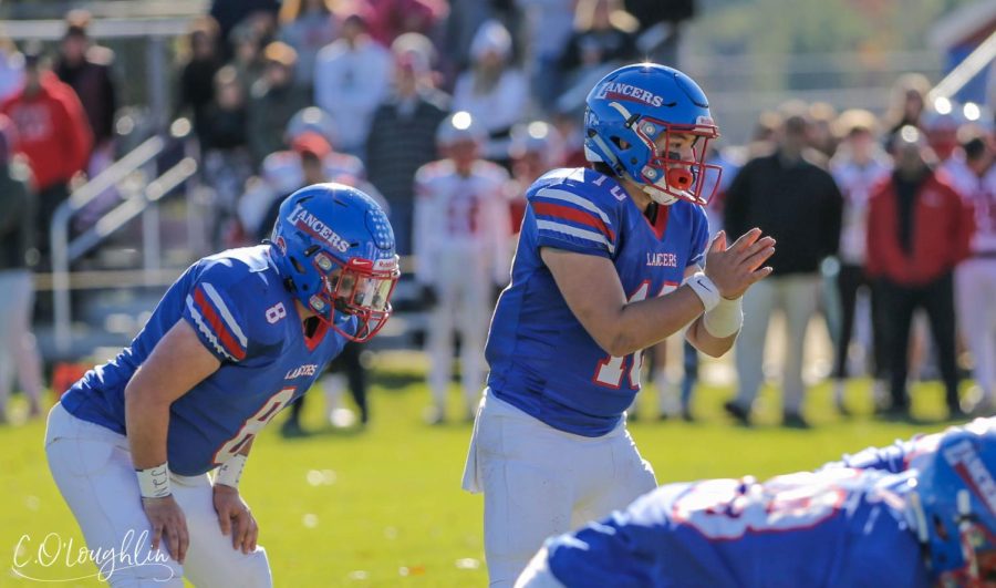 Quarterback Drew Heenan and running back Matt Perron.