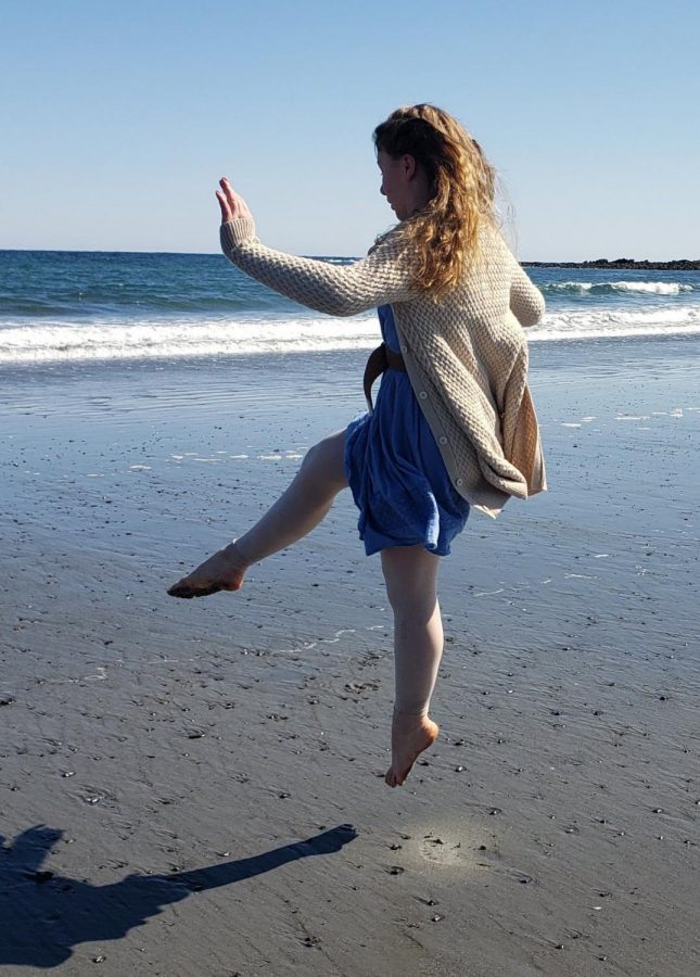 At the beach, Alea Millis leaps into the air. Dance remains a way for Millis to deal with ADHD and also just normal stress.