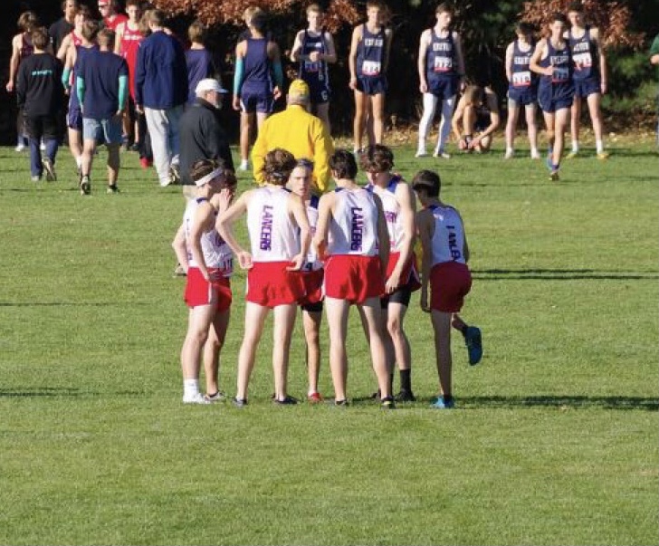 Boys Cross country prepares to race at the New England meet.
