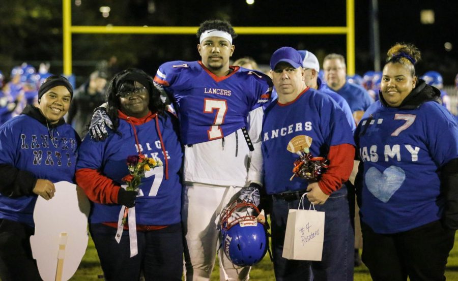 Mikey Rosatano celebrates Senior Night with his family.