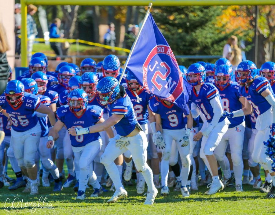 The Lancers run out for the quarterfinals vs. Pinkerton. The boys defeated the Astros 25-13.