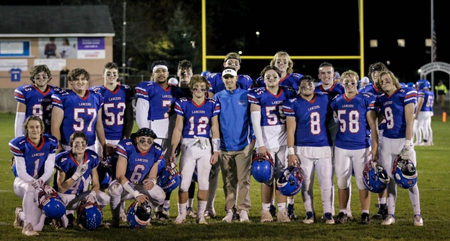 Lancer football players celebrate their Senior Night.