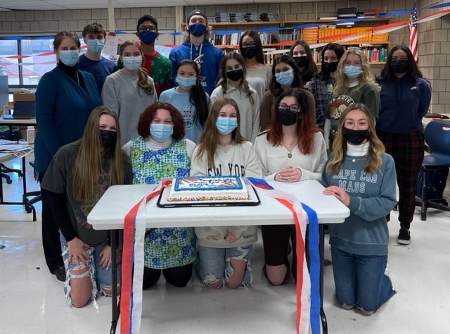 The Lancer Spirit staff celebrates with cake after finding out they are finalists for the 2022 Columbia Scholastic Press Crown Awards.