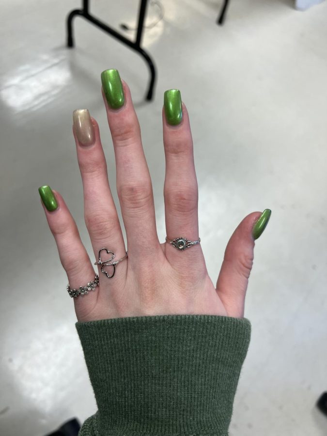 Senior Audrey DeAngelis wears all silver on one hand. 