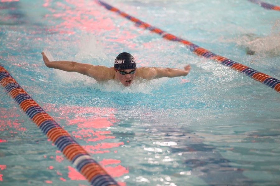 Sophomore Sean Bailey is shown “gliding through the water” at one of his swim meets.
