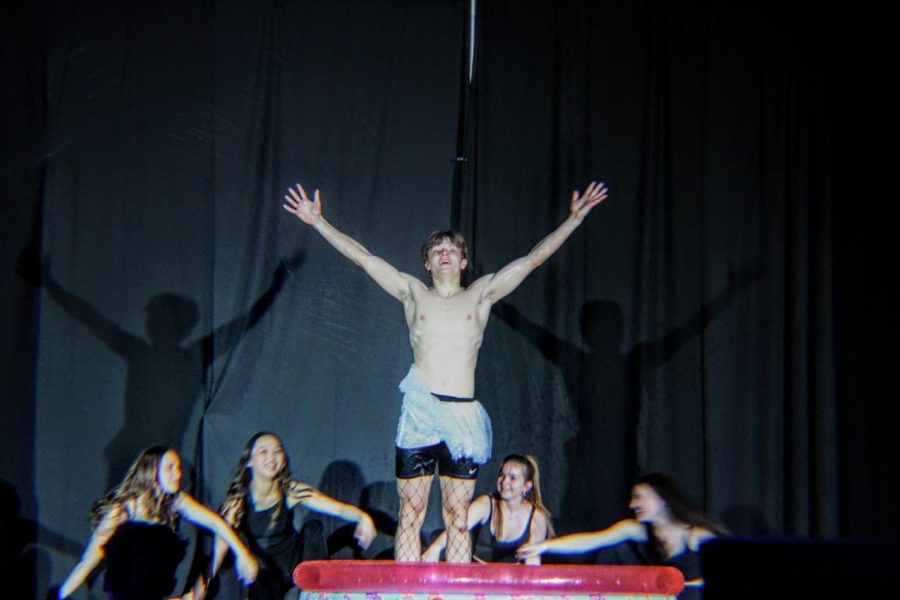 John Baumann dances to Umbrella alongside members of the Lancer Dance Team.