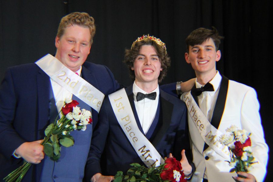 From left to right: runner up Nate Seibert, Mr. LHS Colby Lynch, and second runner up Liam White smile following the competition.