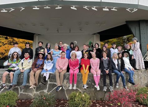 The members of the drama club who participated in their annual Haunted Woods fundraiser pose together before the first night of the event starts.