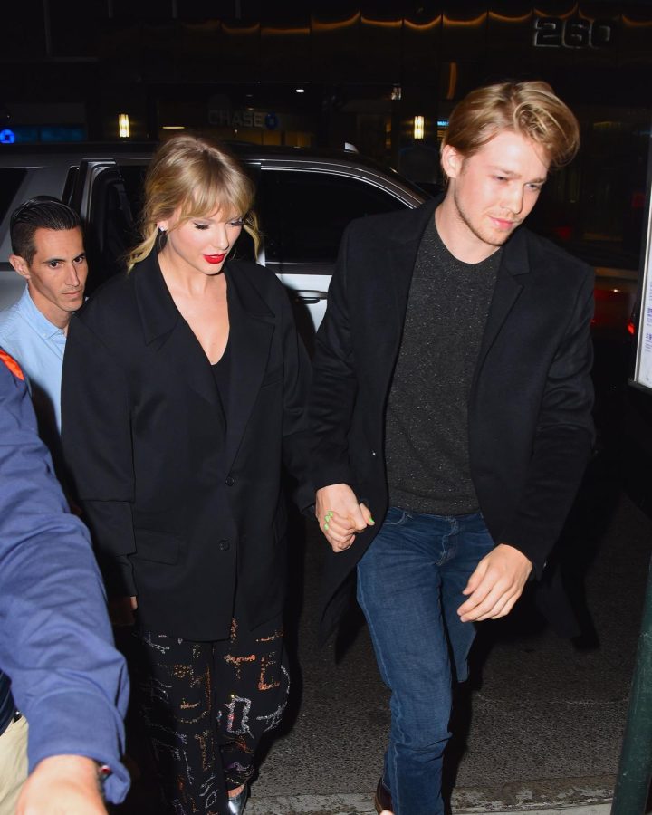 Swift walks hand in hand with her current boyfriend, Joe Alwyn. Swift and Alwyn have been together for 6 years.