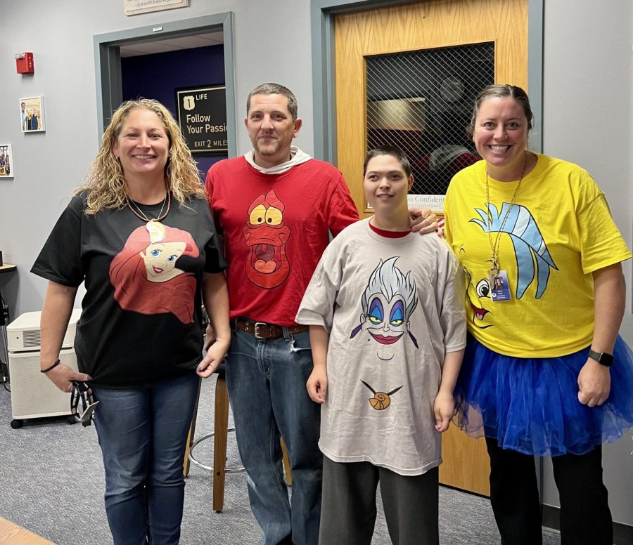 House 1 AP Abbey Flounder Sloper and Special ed. teachers Denise Ariel Gaspie and Nick Sabastian Theos  swim Under the Sea with student Zac Ursula Marshal.