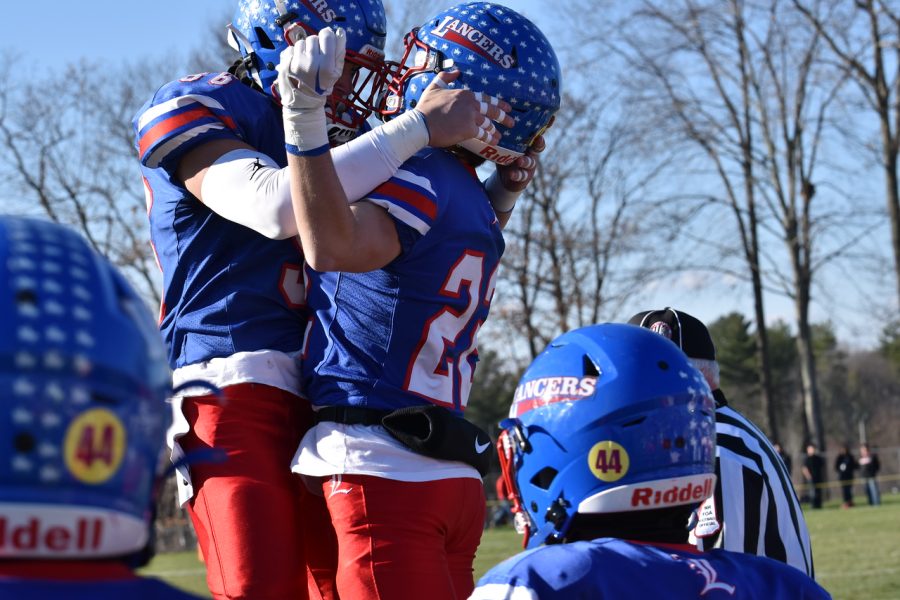 Players jump in the air, praising one another after scoring.