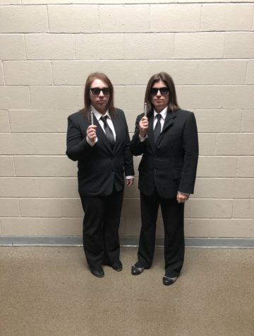 Mrs. Shurtleff (left) stands with Mrs.Brayall (right) during spirit week at Manchester School of Technology. They were both dressed up as characters from Men in Black. 