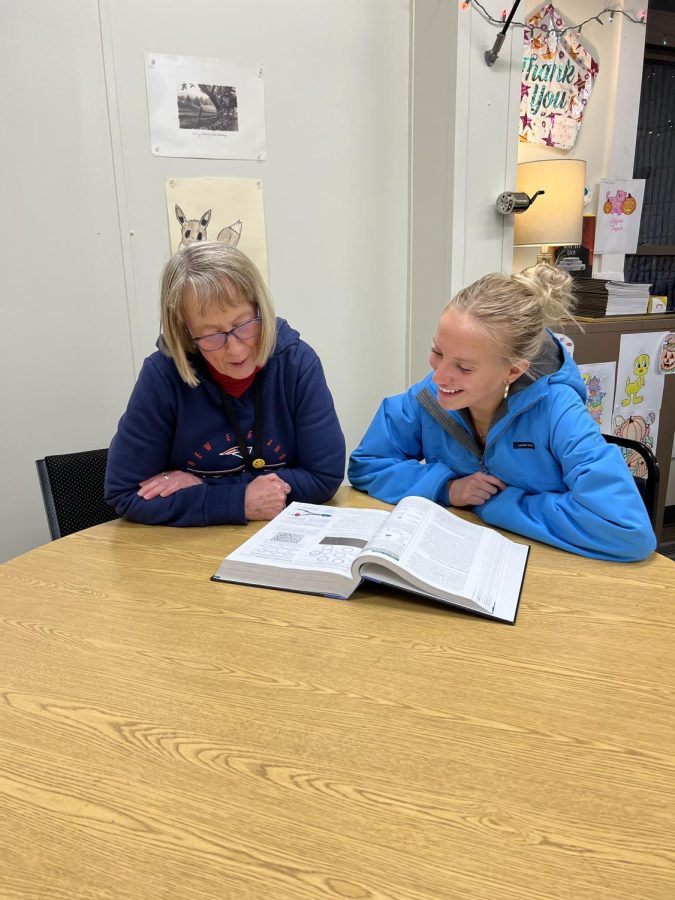 Special ed. teacher Kerry Miller helps senior Ava Norton with an assignment in her classroom. Special ed teachers often take the time to help students understand what they’re learning. 