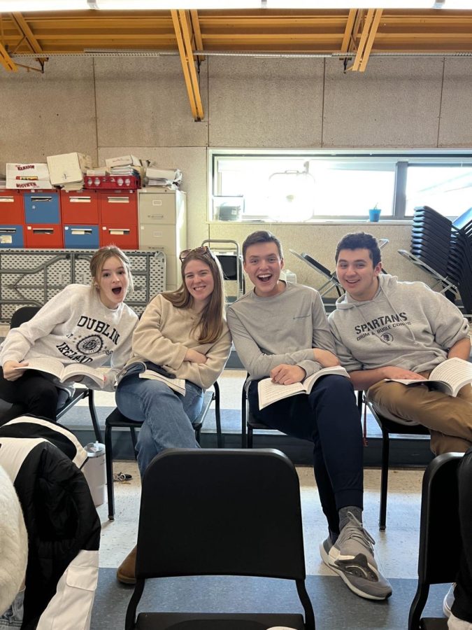 Seniors Rae Pizzi and Frank Thomas and juniors Joey Cain and Kelly Egan rehearse their songs from the musical during an after school rehearsal. 