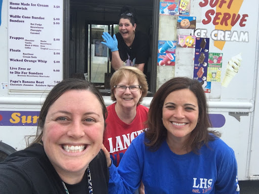 Ms. Sloper (left), Mrs. Sherwood (right) and Dawn Myers (back) at the end of the school year in 2018. They had an ice cream truck come to the school to buy treats to support the class of 2019. According to Mrs. Sloper, Mrs. Sherwood LOVED treats! 
