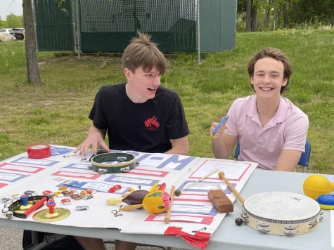 Seniors Nate Pope and Aaron Owre host a booth for the Tri-M Music Honor Society at Tuesdays Speak Up Day. A variety of LHS clubs and community mental health organizations provided information to students about available resources as well as offering a sense of community to those who may need it.