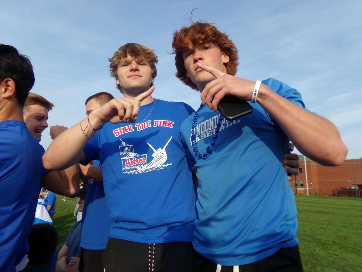 Friends Tom Martin and Owen Carey watching the boys game and cheering them on!