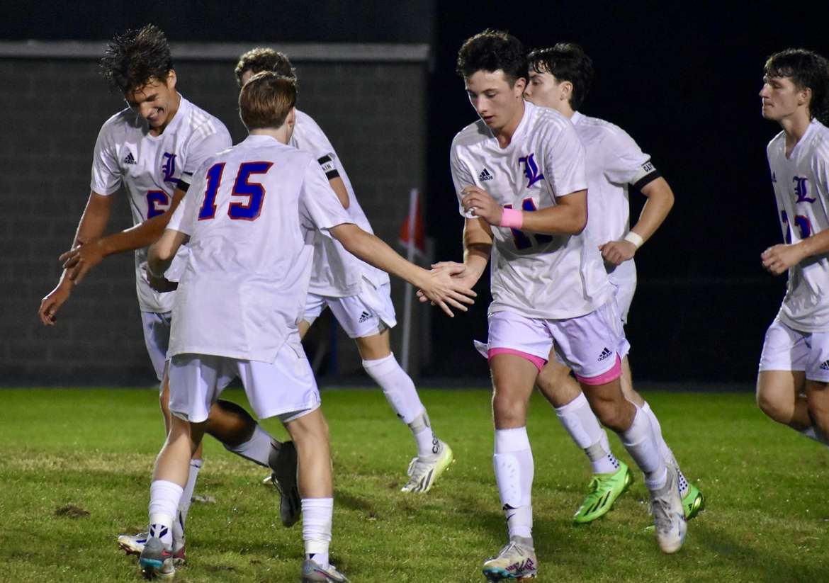 Team Celebrating after goal