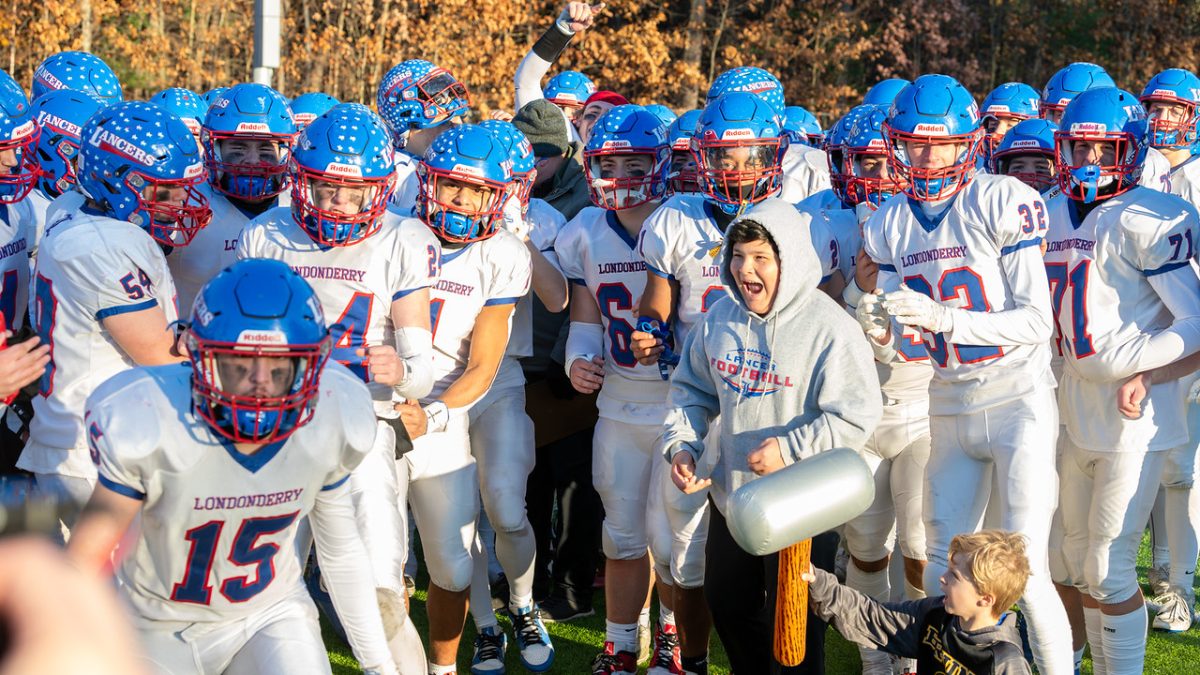 Lancers celebrating the big win. (Photo by Charlie Ogden)  