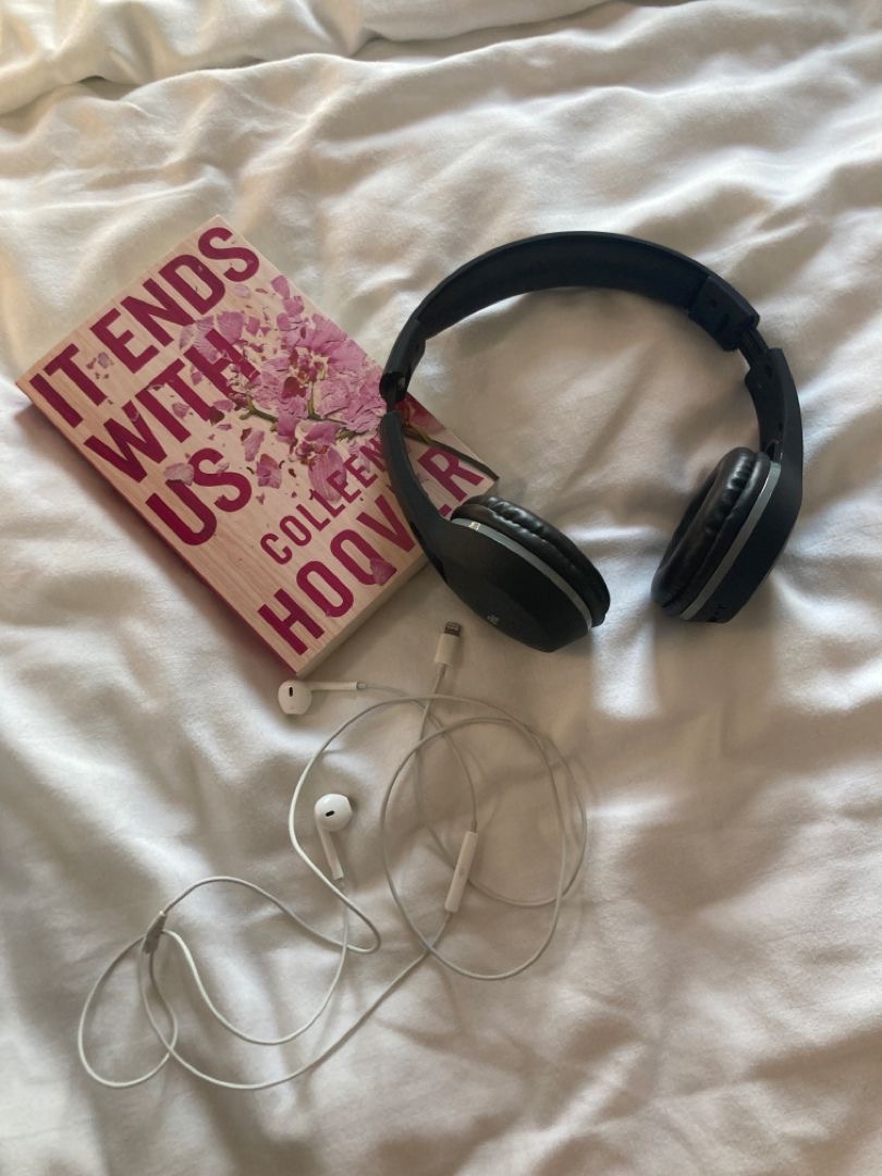 Put on the headphones and start the 2024 TBR list. 
Image by Pinterest 