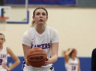 Sullivan prepares to score from the free throw line.