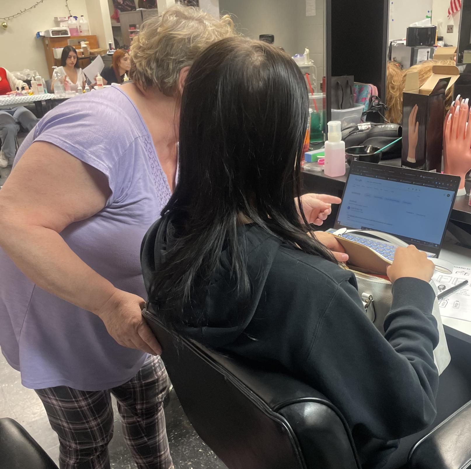 Mollie Chase helps her students gain experience with their communication skills through salon basics online courses.