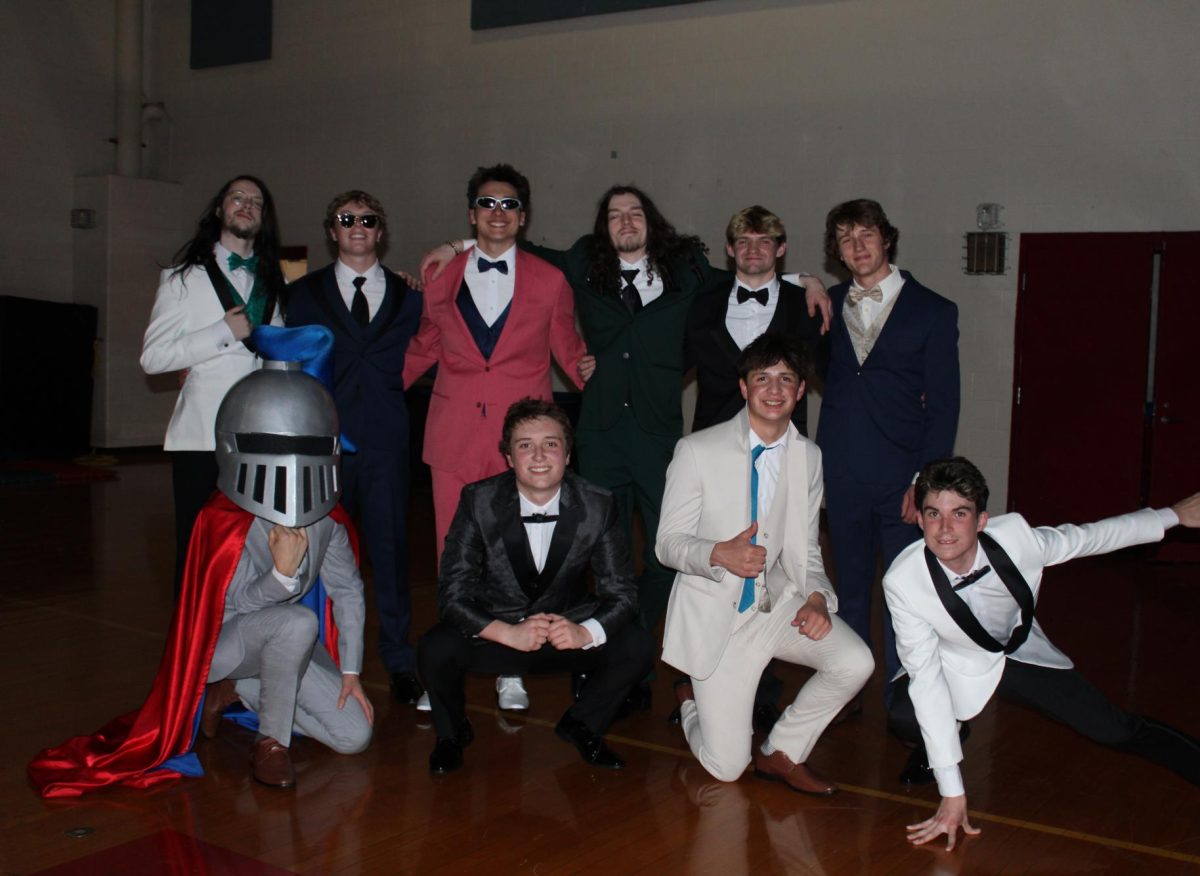 The contestants and host, Dillon Tufts, prepare to take the stage.