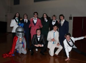 The contestants and host, Dillon Tufts, prepare to take the stage.