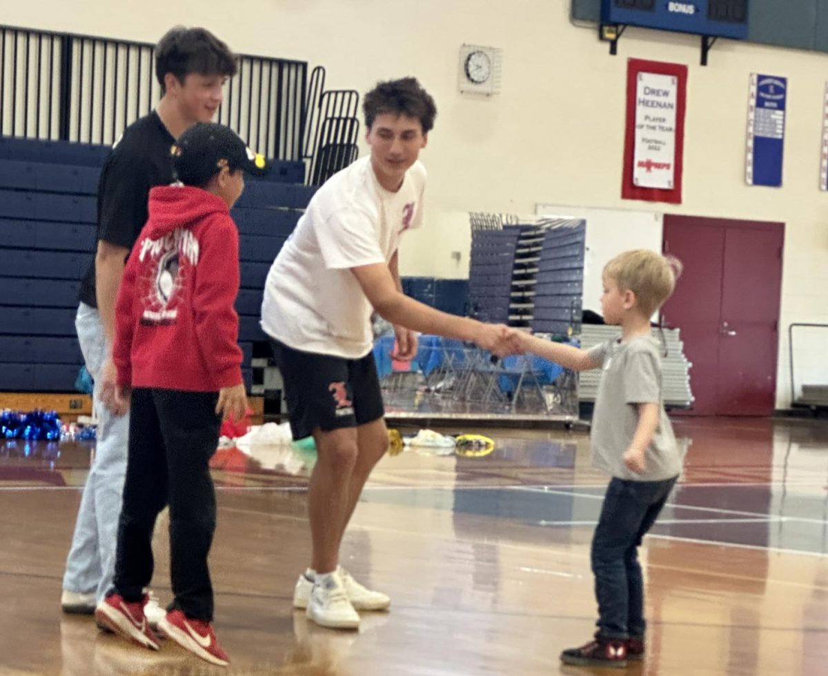Senior Blake Thompson meets his match during a dance off competition.
