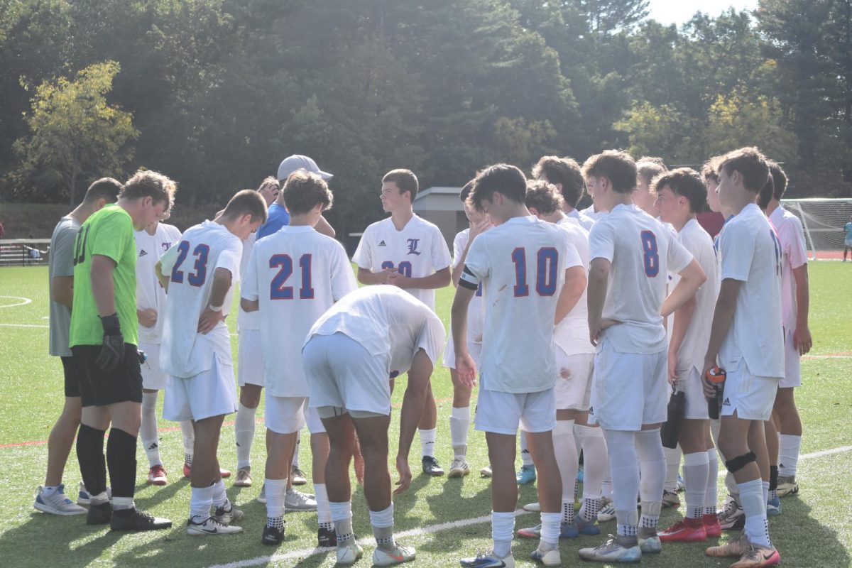 The team talks strategy before the game.