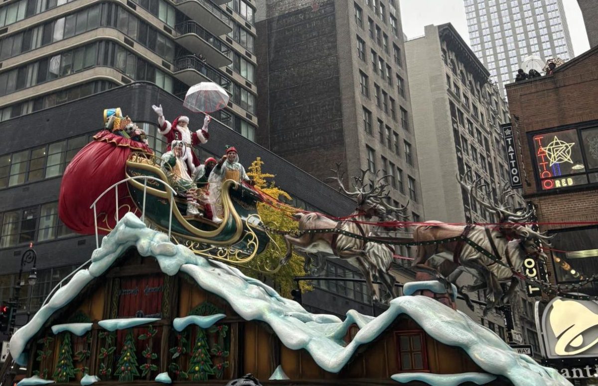 Santa is the last act in the parade and is seen waving to children amongst the crowd. He rides in a sleigh, assisted by elves on the ground. Not only does his presence end the parade, but it also symbolizes the beginning of the holiday season.