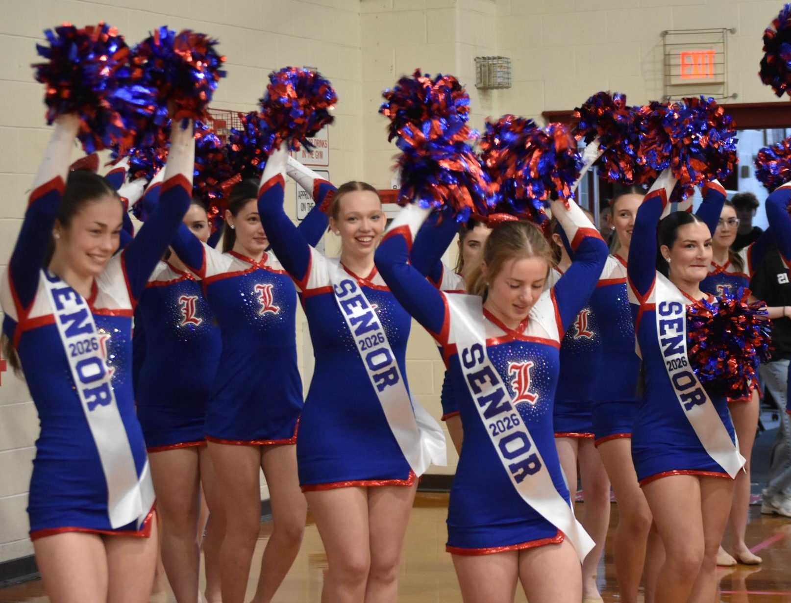 The Lancer Dancers honor their seniors and perform a pom routine, choreographed by Ashley Holt, at the winter pep rally on Dec. 23. 