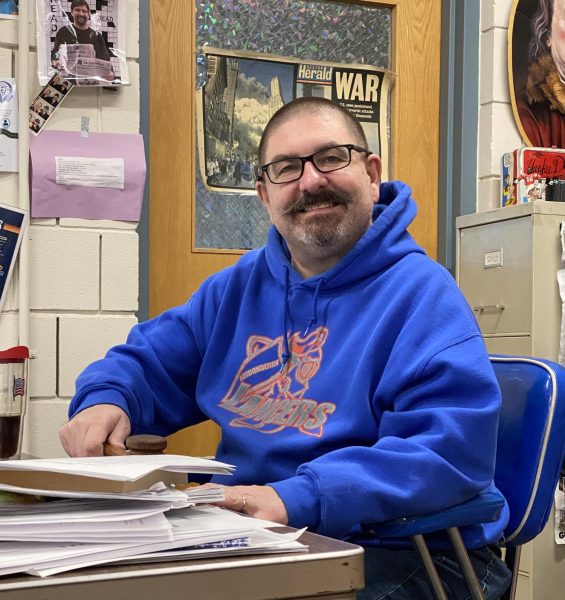 Social studies teacher Joe Nalezinski prepares for the day’s lesson in his law and mock trial class. In this class, he guided students through courtroom procedures and class activities. “I like history, Nalezinski said. “It's the story of our past and present and hopefully our future and, you know, the idea of our country, the greatest nation on the planet.”