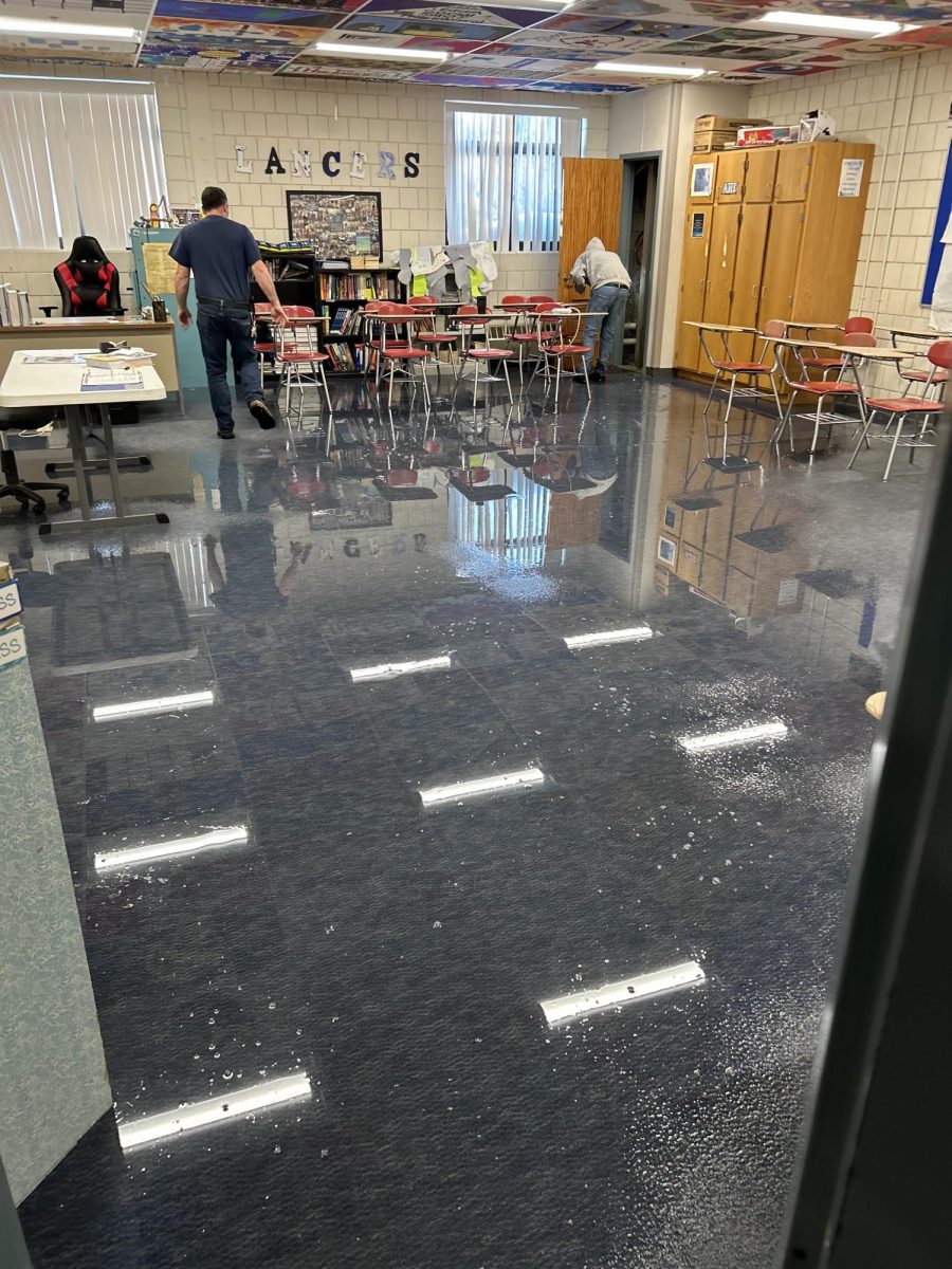 A flood broke out in history teacher Peter Willis’ room on Jan. 27, after a sudden pipe burst due to low temperatures. (Photo use permission by Peter Willis.)