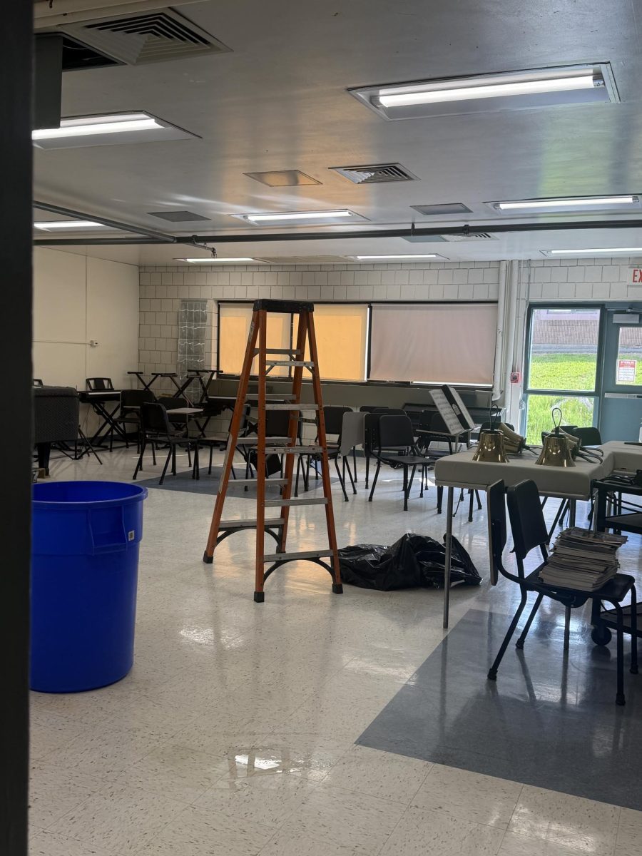 Flood gets handled during C period on May 18 in music elective room. 