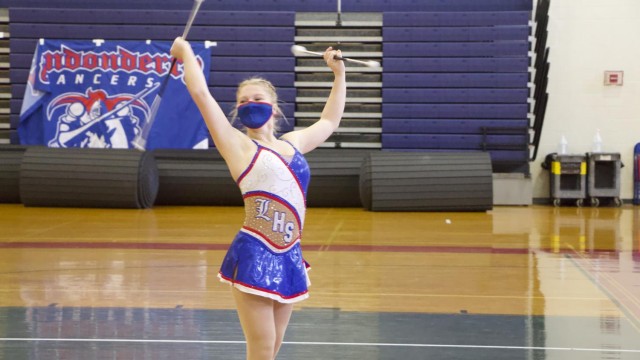 Senior Emily Cowette, LHS' "baton girl" caught in action as she performs at the rally. Photo by Sean O'Mara