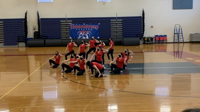 The Lancer Dance Team finishing their astounding show with a coordinated group pose. Photo by Spencer McIntyre