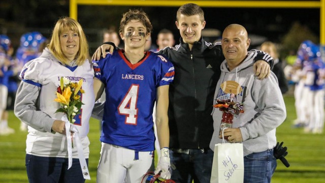 Anthony Salcito celebrates Senior Night with his family.