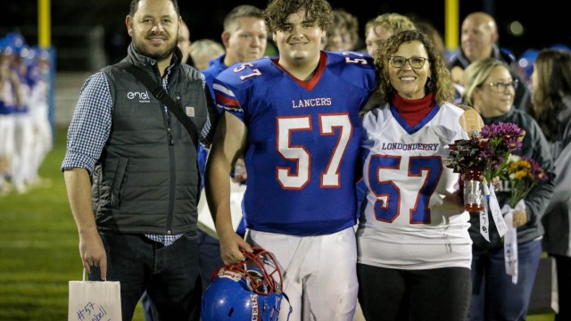 Cam Campbell celebrates Senior Night with his family.
