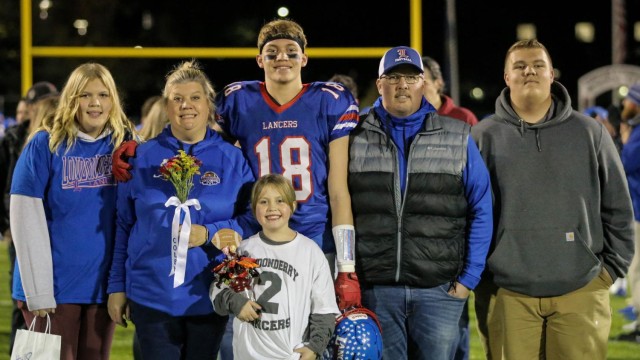 Colby Ramshaw celebrates Senior Night with his family.