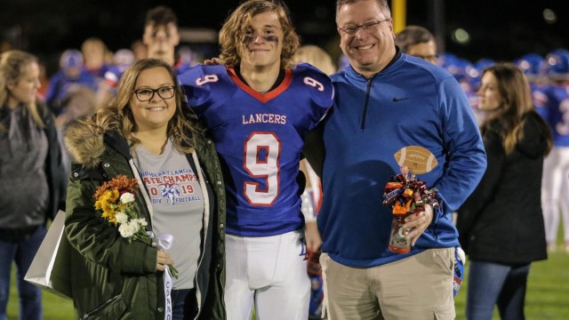Connor Howe celebrates Senior Night with his family.