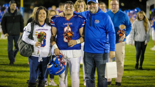 Matt Perron celebrates Senior Night with his family.